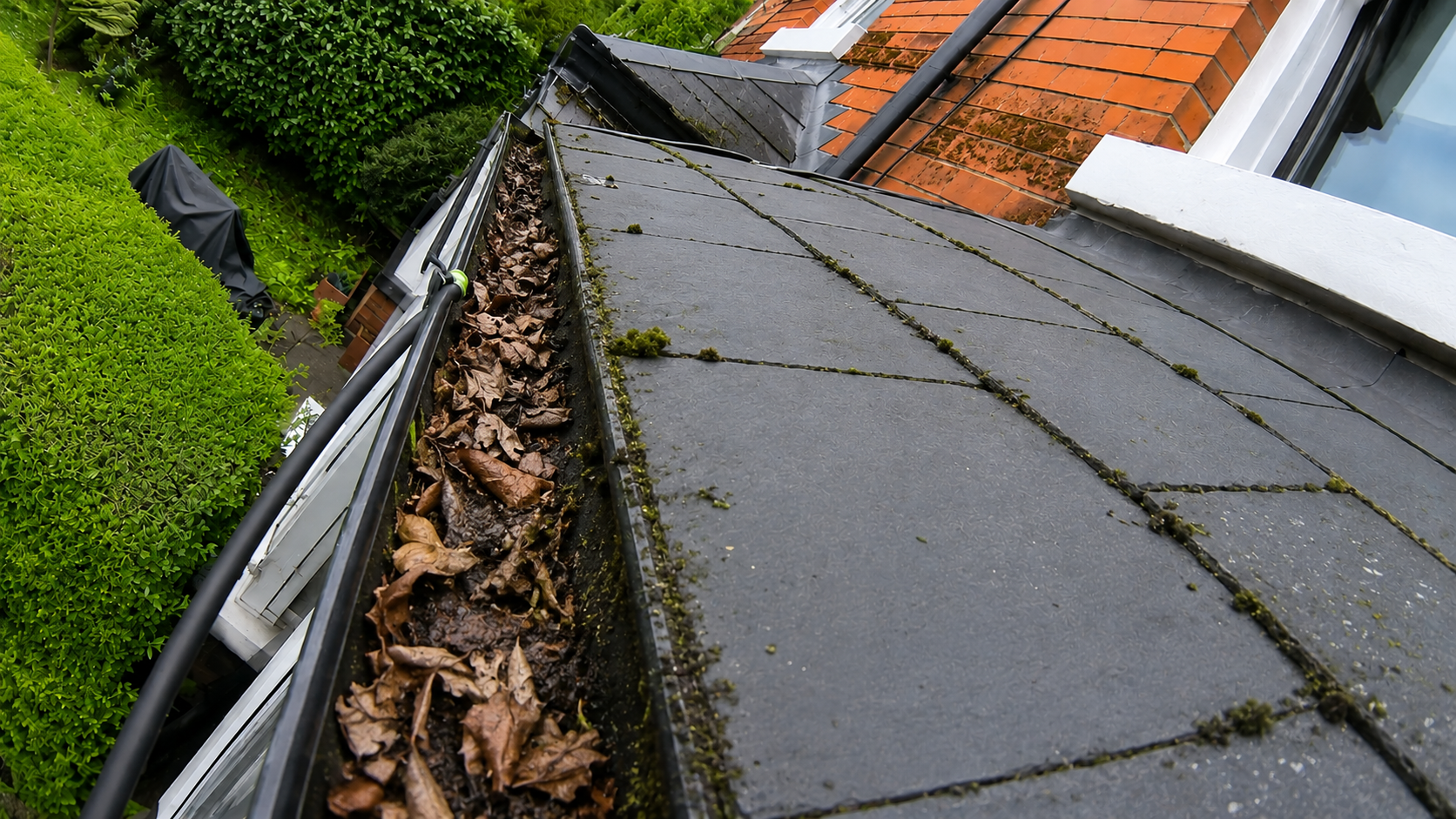 Before gutter cleaning Balsall Heath B12 — urban silt and debris compaction